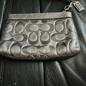Coach Metallic silver wristlet